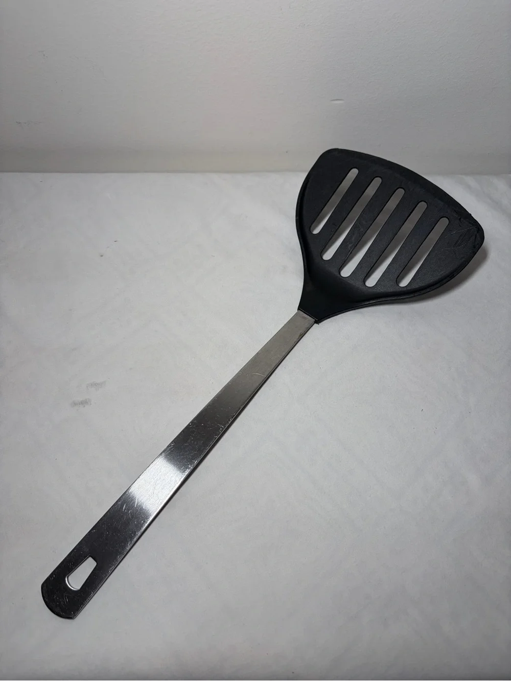 AMCO Black Slotted Turner Spatula with Stainless Steel Handle